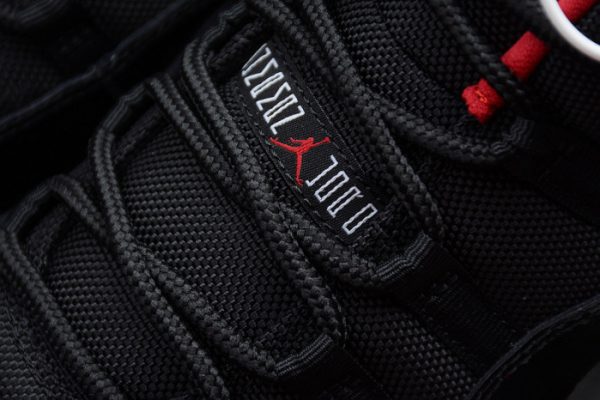 AIR JORDAN 11 RETRO LOW "BRED" BLACK/ RED mens 528895-012