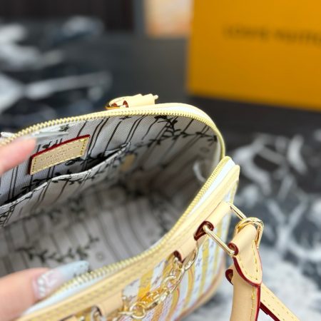LV Alma Trunk Shell Bag - Image 10