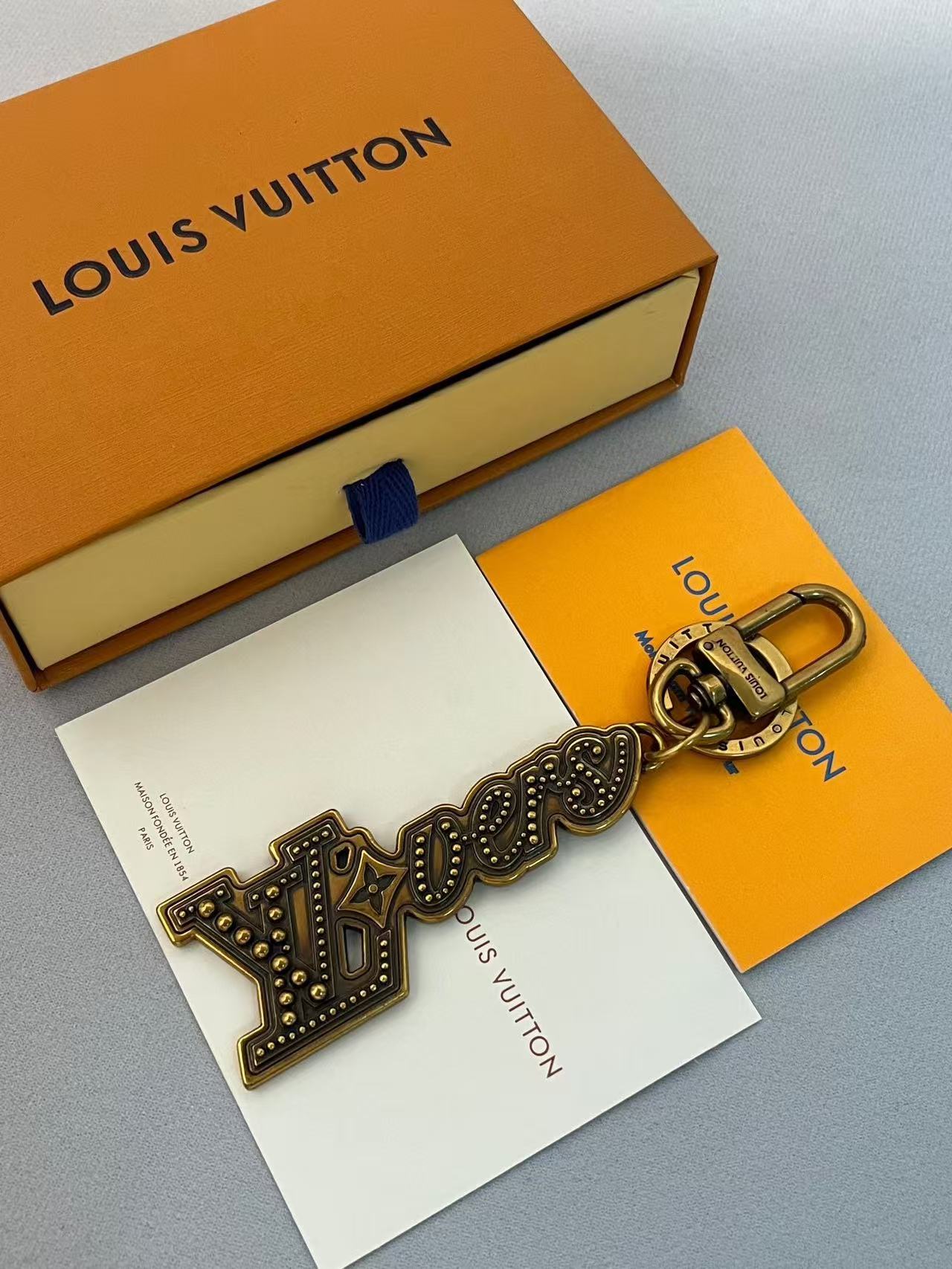 LV Lovers Stud Charm Key Holder - Image 3