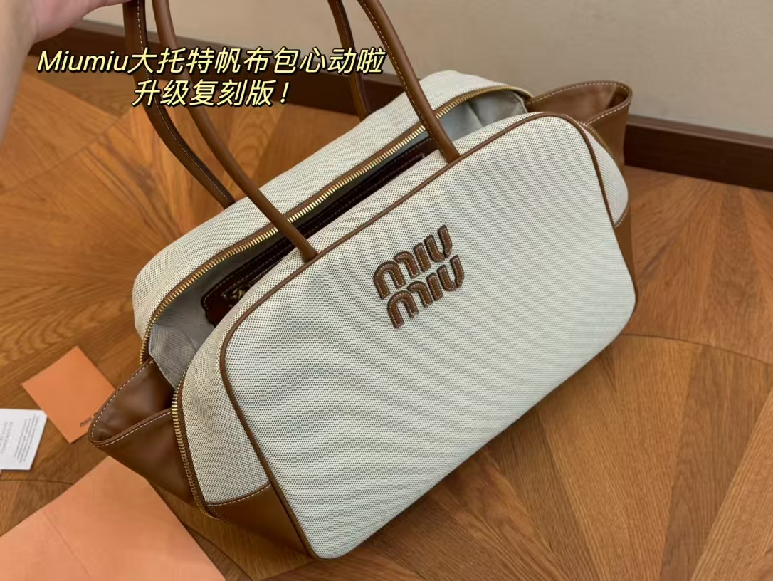 Miu Miu Beau Canvas and Leather Top Handle Bag - Image 1