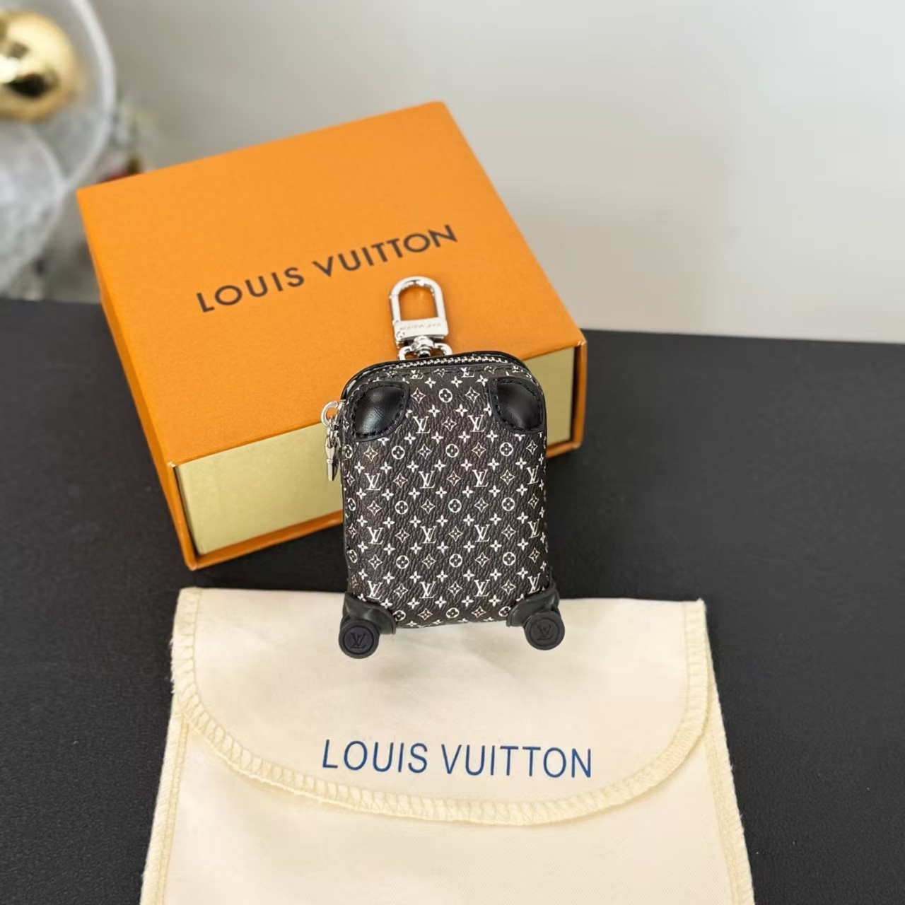 LV x TM Horizon Airpod Case Bag Charm - Image 4