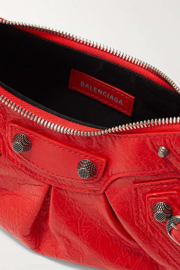 BALENCIAGA Le Cagole XS studded crinkled-leather shoulder bag red