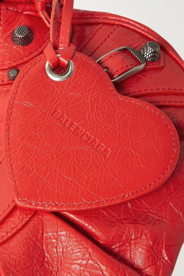 BALENCIAGA Le Cagole XS studded crinkled-leather shoulder bag red