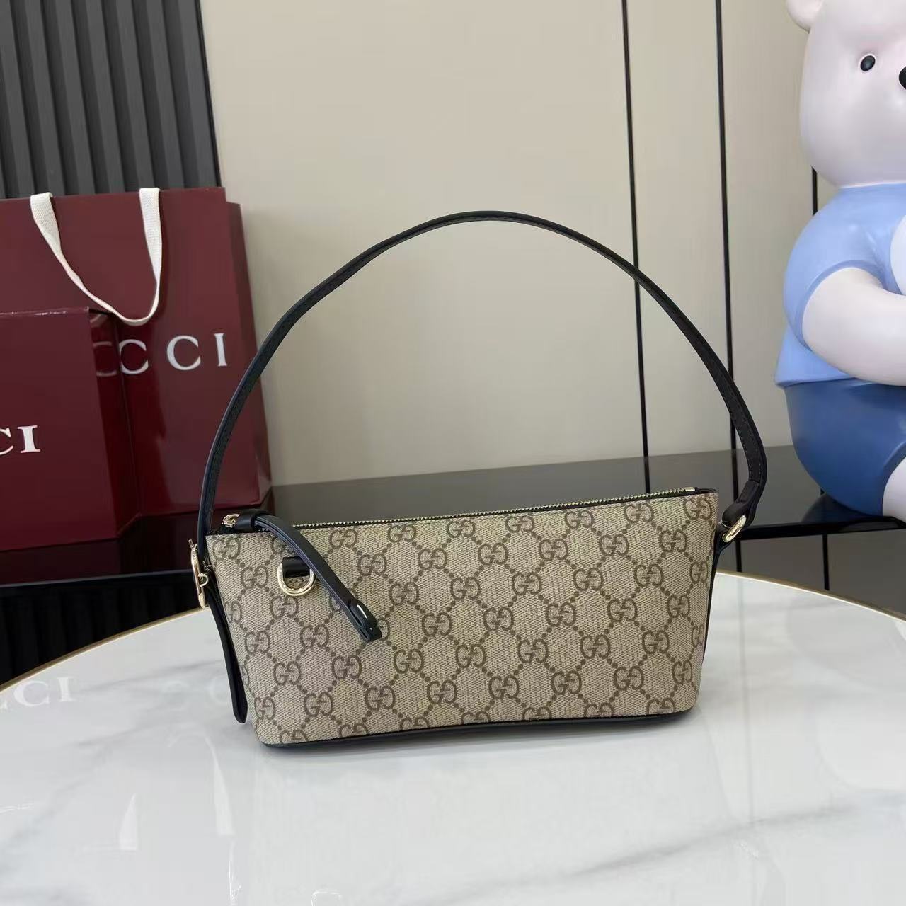 Gucci Emblem Mini Bag - Image 1