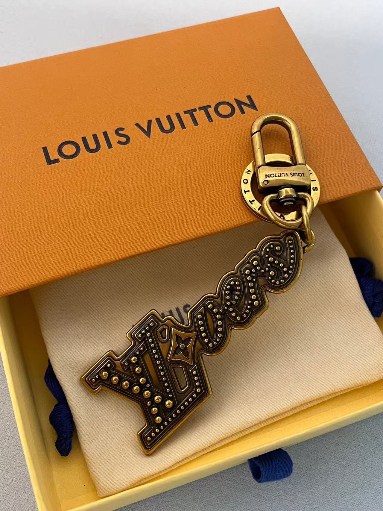 LV Lovers Stud Charm Key Holder - Image 1