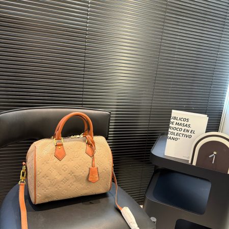 LV Embossed Pillow Bag - Image 1