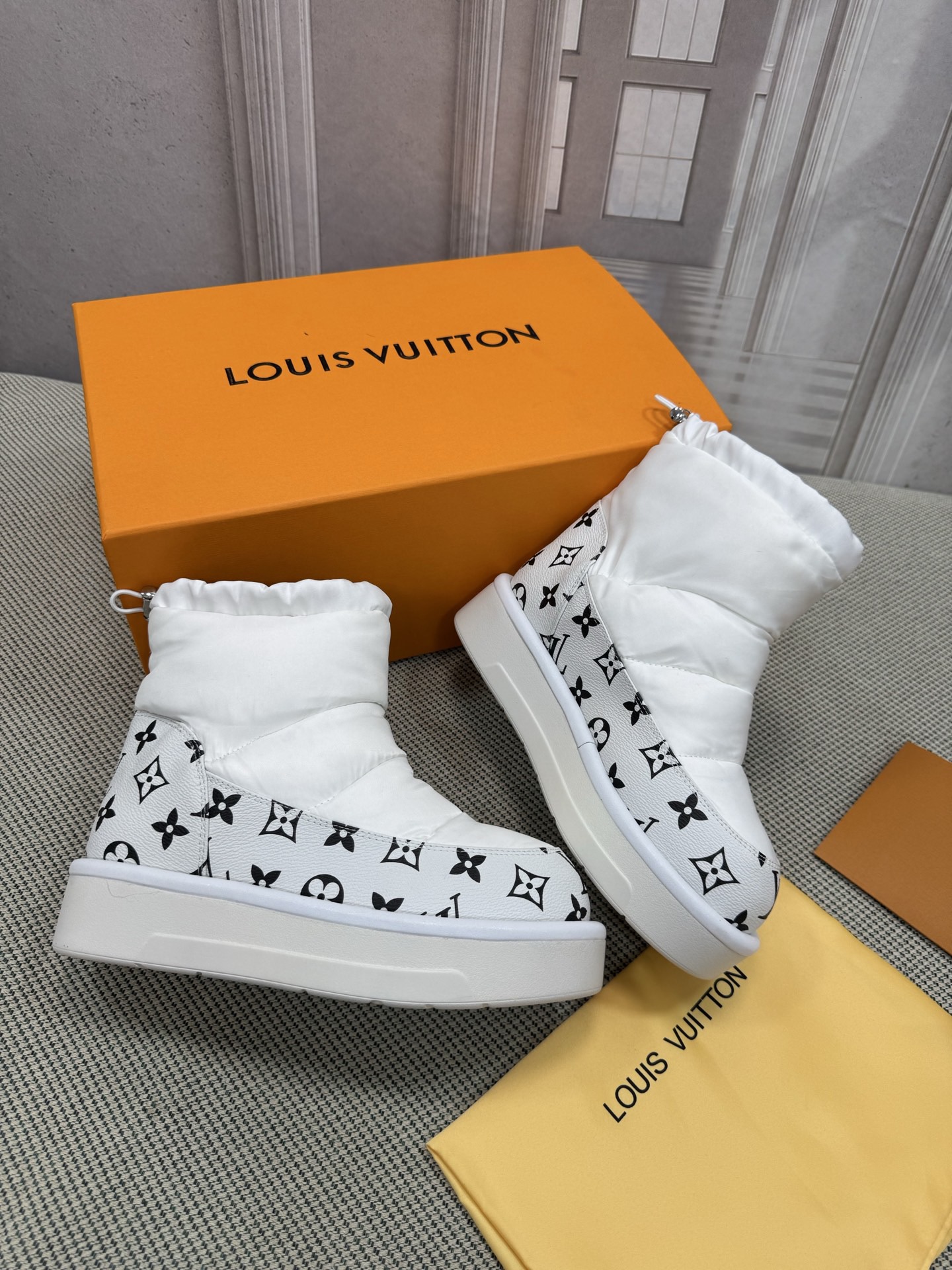 LV Down Snow Boots - Image 1