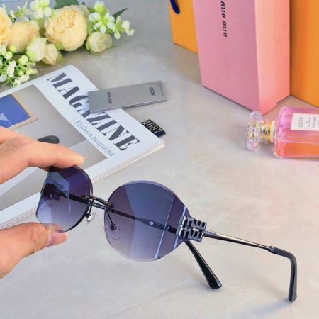 Miu Miu Sunglasses - Image 1