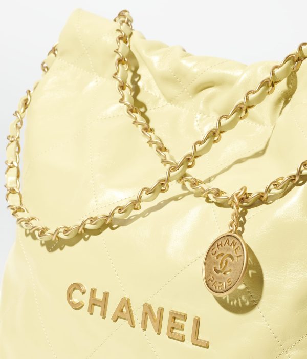 CHANEL 22 SMALL HANDBAG Calfskin & Silver Metal Yellow