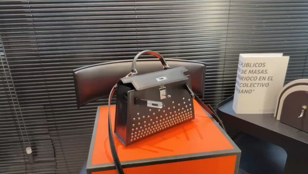 Hermès Mini Kelly 2nd Generation Black and Silver Handbag