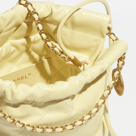 CHANEL 22 MINI HANDBAG Shiny Calfskin & Gold-Tone Metal Light Yellow - Image 4