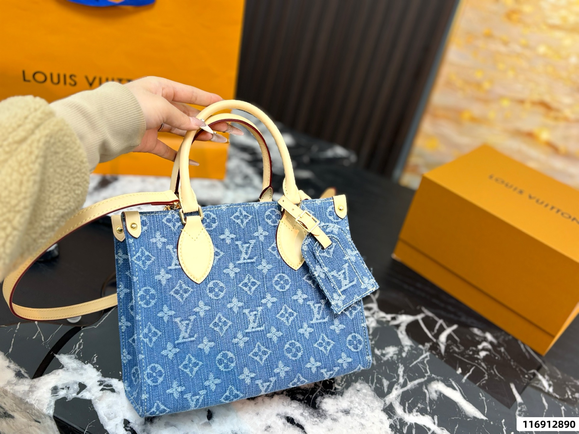 LV Monogram Denim OnTheGo PM Bag - Image 1
