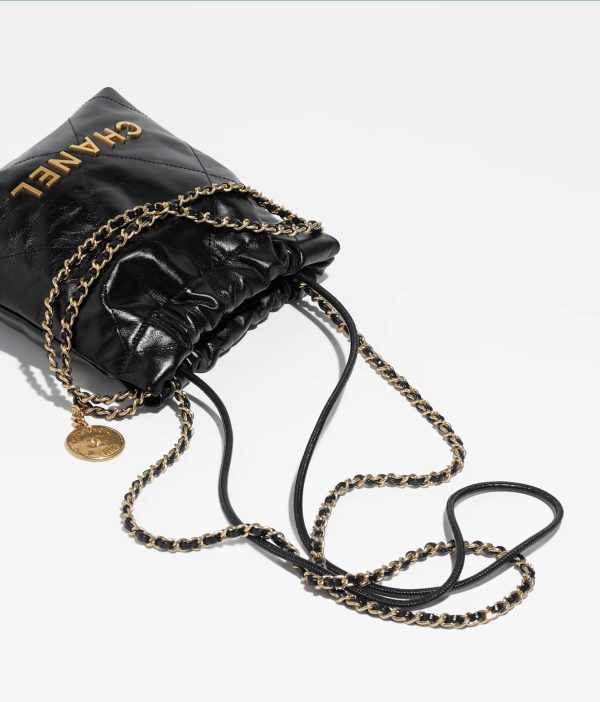 CHANEL 22 MINI HANDBAG Shiny Calfskin & Gold-Tone Metal Black