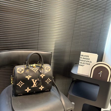 LV Embossed Pillow Bag - Image 1