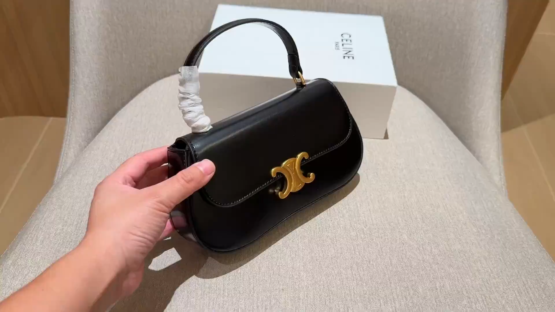 Celine Classic Flap Handbag in Black with Gold Logo - Image 1