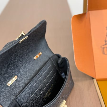 LV's New Madeleine Underarm Bag - Image 11