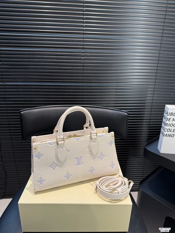 LV OnTheGo East West Bag
