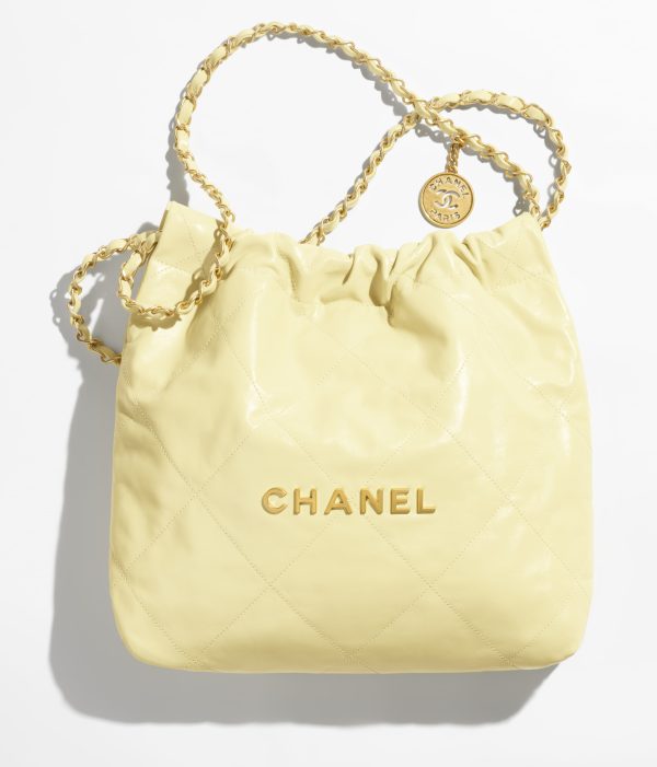 CHANEL 22 SMALL HANDBAG Calfskin & Silver Metal Yellow