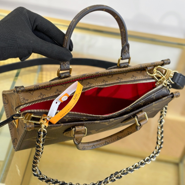 LV On the Go East West Chain Handbag