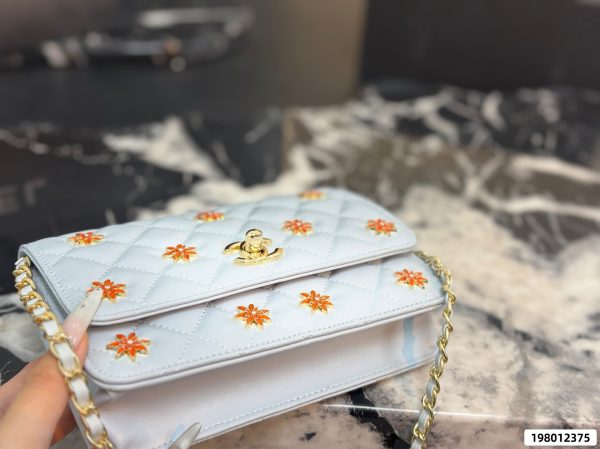 Chanel WOC Badge Chain Clutch