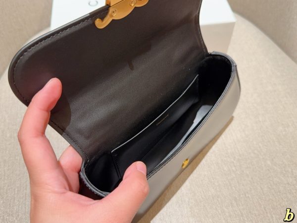 Celine Classic Flap Handbag in Black with Gold Logo