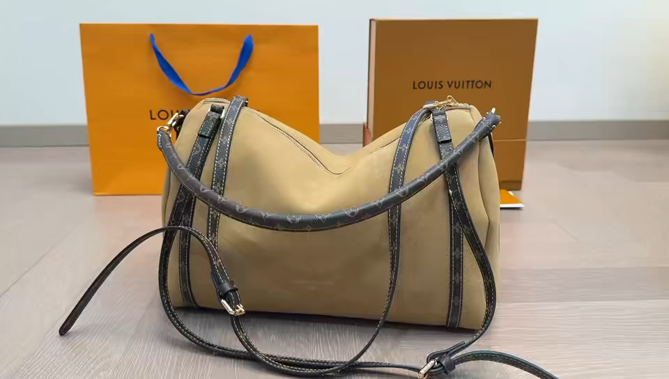 LV Express Pillow Bag - Image 1