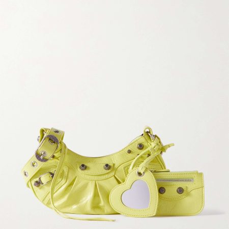 BALENCIAGA Le Cagole XS studded crinkled-leather shoulder bag yellow