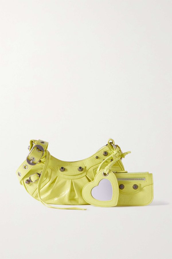 BALENCIAGA Le Cagole XS studded crinkled-leather shoulder bag yellow