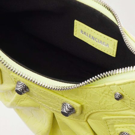 BALENCIAGA Le Cagole XS studded crinkled-leather shoulder bag yellow - Image 2