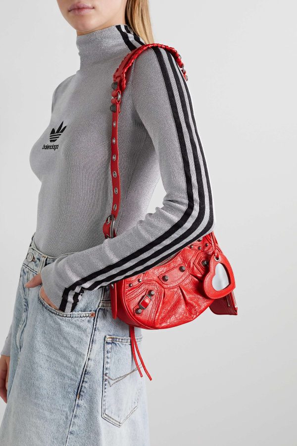 BALENCIAGA Le Cagole XS studded crinkled-leather shoulder bag red