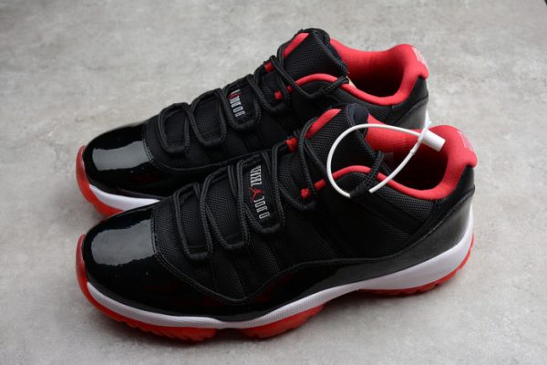 AIR JORDAN 11 RETRO LOW "BRED" BLACK/ RED mens 528895-012