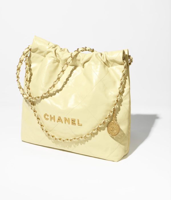 CHANEL 22 SMALL HANDBAG Calfskin & Silver Metal Yellow