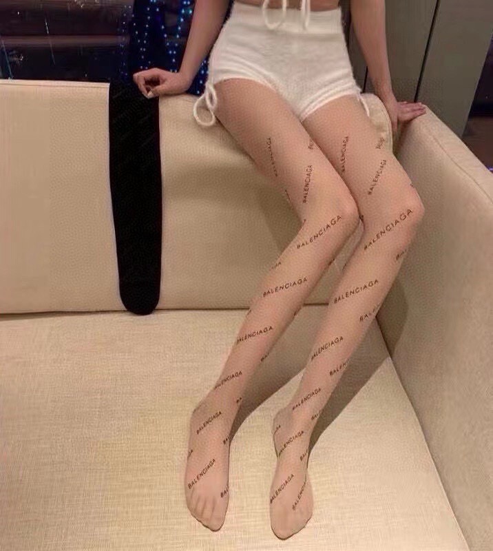 Balenciaga's Viral Letter-Printed Rubber Stockings - Image 1