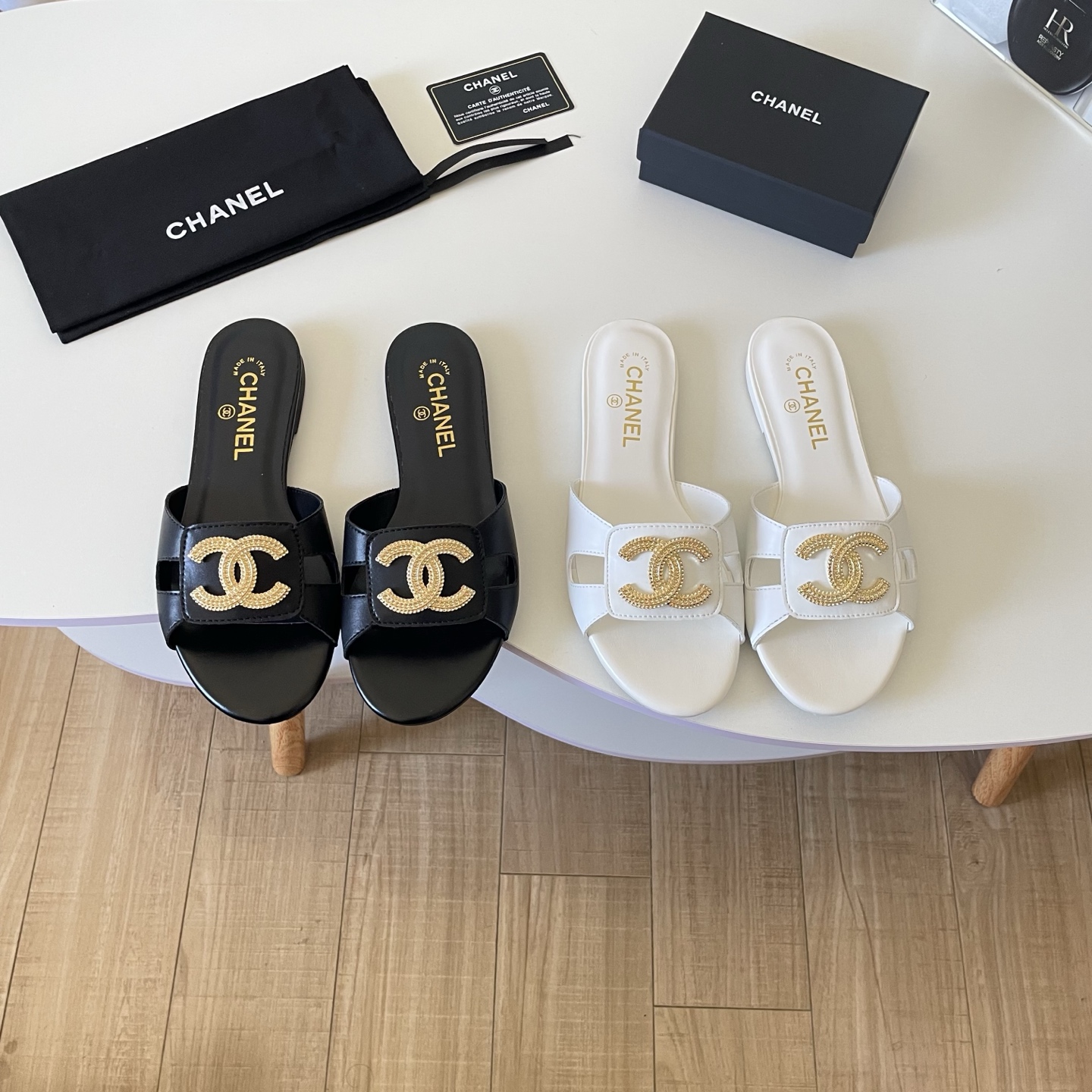 Chanel 26P Large C-Logo Openwork Flat Slippers - Image 1
