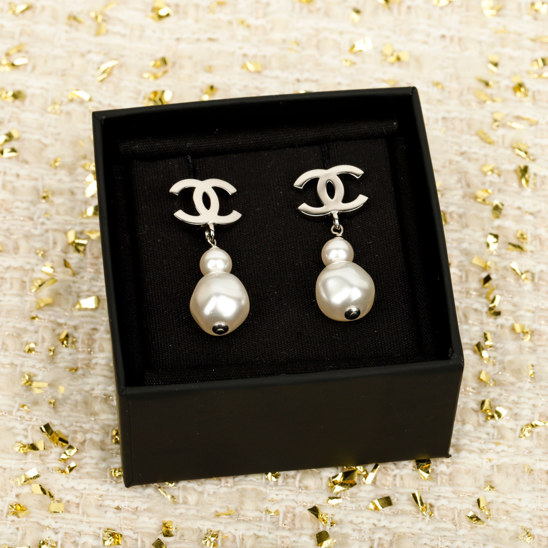 Chanel C Pearl Earrings - Image 1
