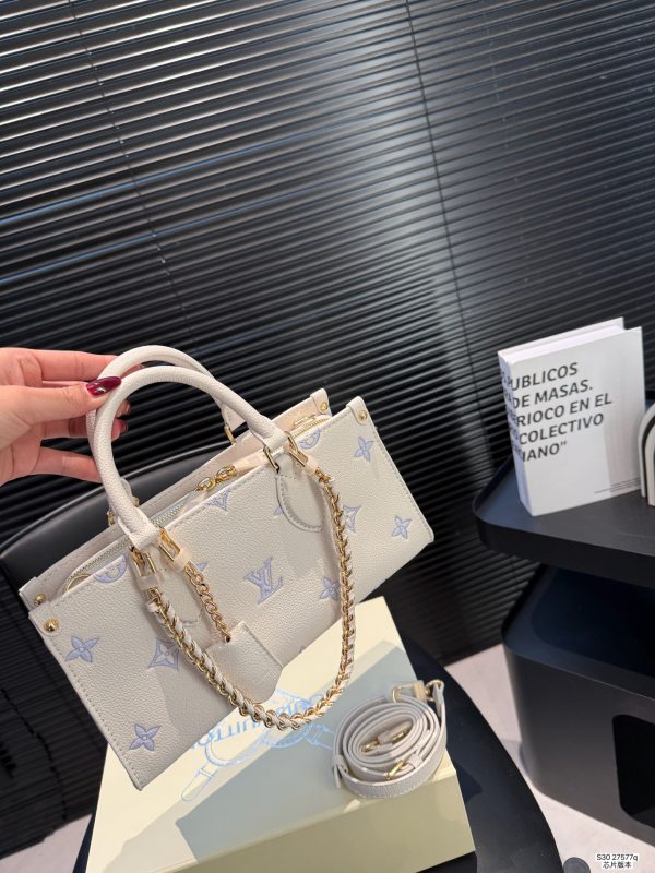 LV OnTheGo East West Bag