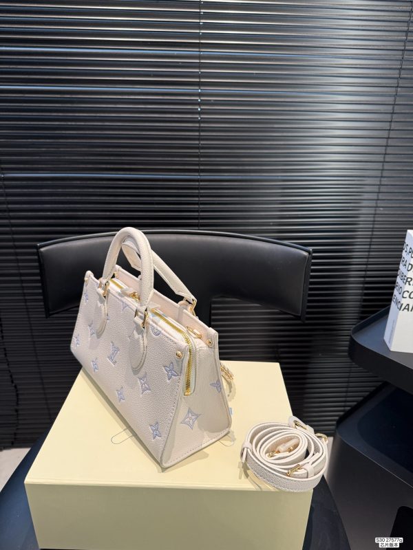 LV OnTheGo East West Bag
