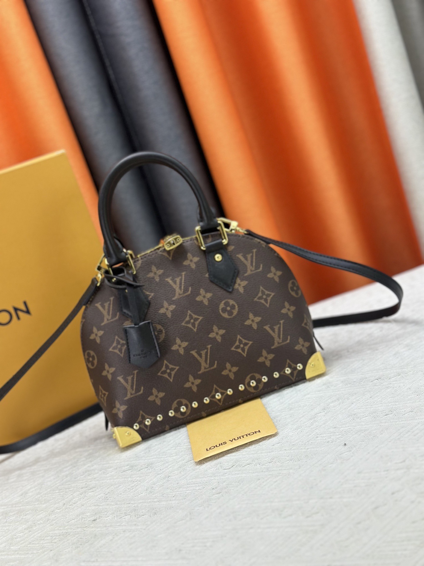 LV Alma Bridge Shell Bag - Image 1