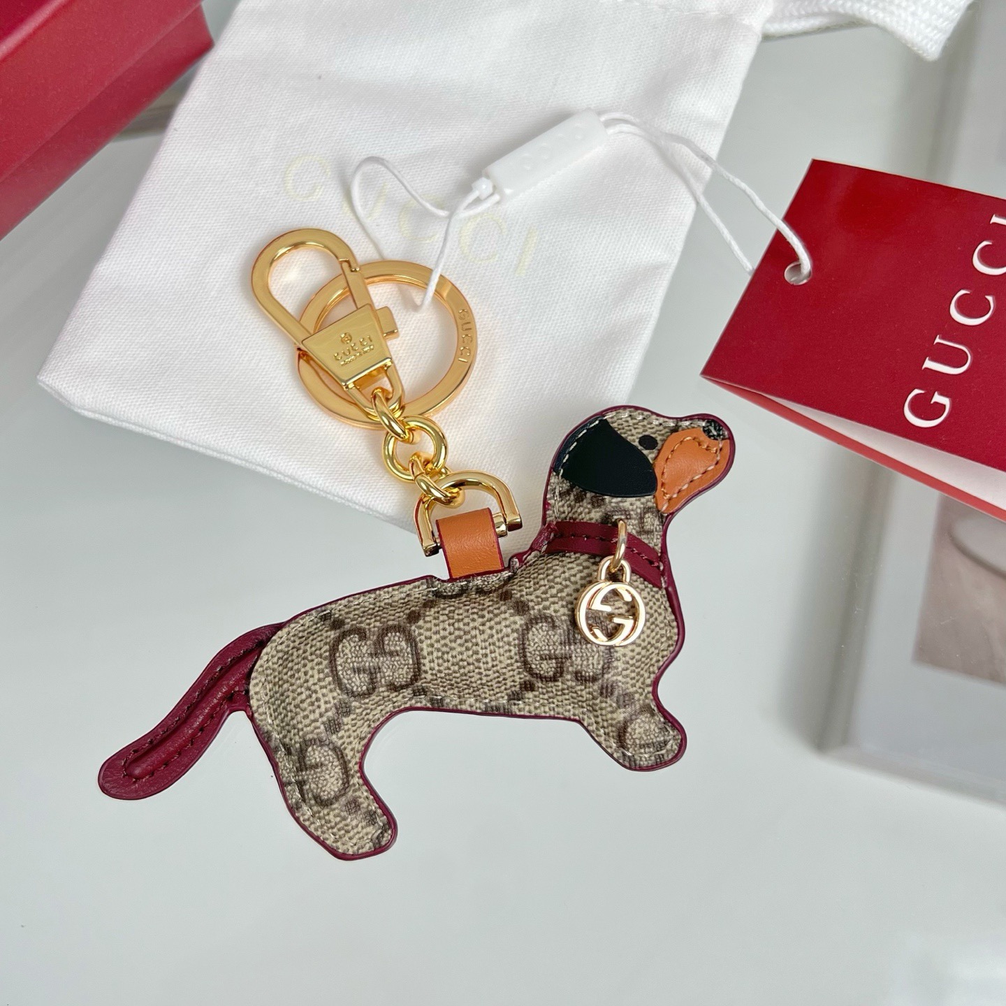 Gucci Dog Charms - Image 1