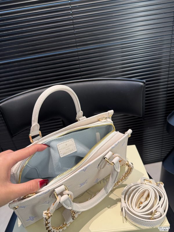 LV OnTheGo East West Bag