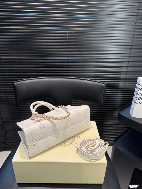 LV OnTheGo East West Bag