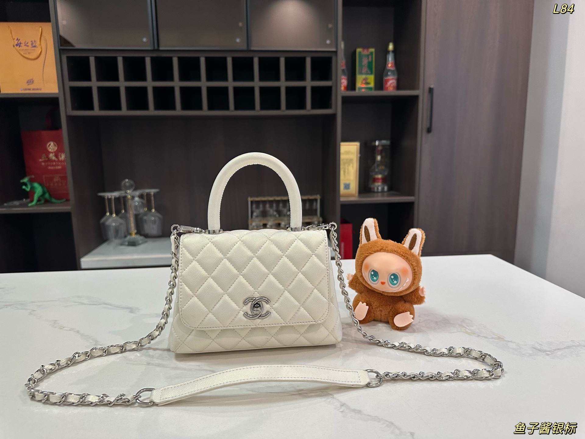 Chanel Quilted Caviar Mini Coco Top Handle Flap Bag - Image 1