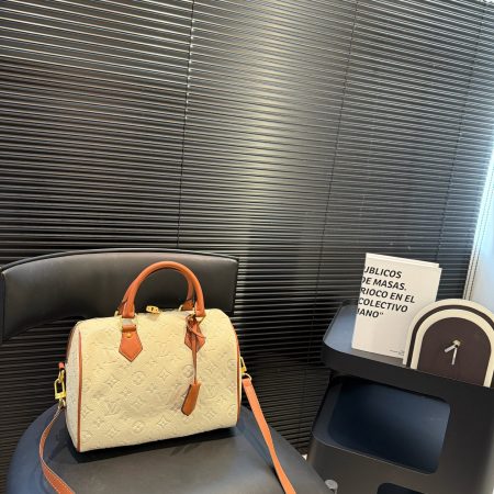 LV Embossed Pillow Bag - Image 1