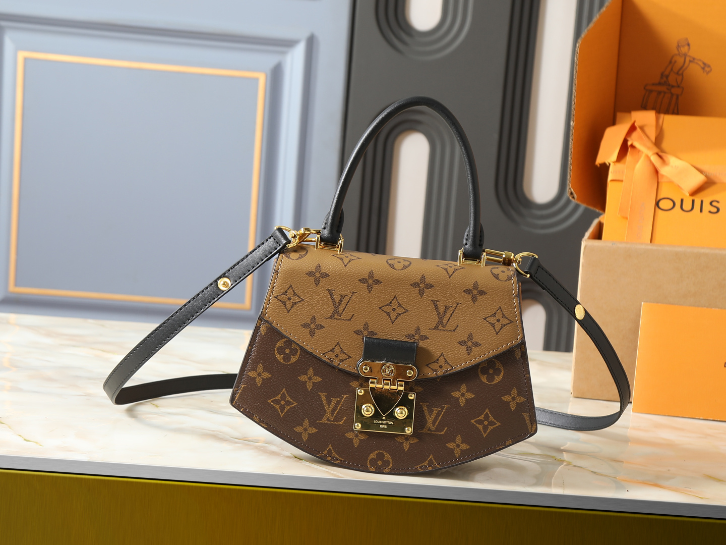 LV  Umbrella-Shaped Two-Tone Monogram Bag - Image 1