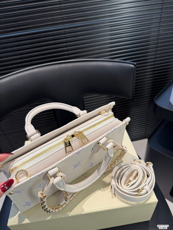 LV OnTheGo East West Bag